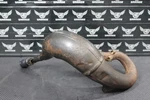 2004 Kawasaki KX65 02-22 Oem Exhaust Pipe Chamber Header 18120-1116. Fixed Price $129.99.