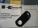 Nos Kawasaki 1980 Exhaust Bracket K18001-216. Fixed Price $56.99.