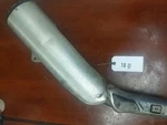 Suzuki V-strom Left Muffler 2002 14306-06G02-H01. Fixed Price $150.00.