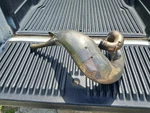1998 YZ250 Pro Circut Racing Development Platinum Pipe For Repair - Cracked. Fixed Price $75.00.