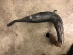 82 Suzuki PE-175 Exhaust Pipe, 14310-14420-H01. Fixed Price $99.00.