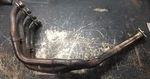 Very Good Oem 04-05 Suzuki GSXR750 Exhaust Manifold Header Asy 14100-30G00. Fixed Price $179.99.