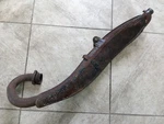 1974 Kawasaki KE125 Exhaust Pipe With Shield Used Oem. Fixed Price $69.00.