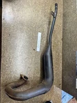 79 Suzuki TS125 Exhaust Pipe Expansion Chamber Head Muffler. Fixed Price $50.00.