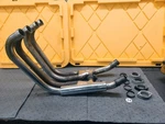1986-87 & 1996-97 Kawasaki ZL600 Exhaust Manifold Assem #39178-1109, #39178-1110. Fixed Price $200.00.