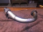 1974 - 1977 Suzuki Center Exhaust Header Pipe Manifold. Fixed Price $49.00.