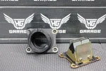 2004 Kawasaki KX65 00-22 Oem Intake Reed Block Assembly 12021-1015. Fixed Price $34.99.