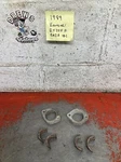 1989 Kawasaki Ninja EX250F Exhaust Clamps And Shims. Fixed Price $19.95.