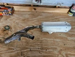 2016 Honda CRF450R Exhaust Left Muffler Oem 18410-MEN-405 (dent). Fixed Price $95.00.