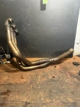 2000 Triumph 955I Speed Triple Head Pipe. Fixed Price $50.00.