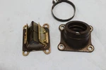 99 Kawasaki KX60 Reed Valve 12021-1015. Fixed Price $18.00.
