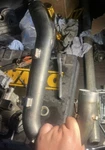 2004-2005 KX250F/ RMZ250 Oem Stock Header Pipe. Fixed Price $120.00.
